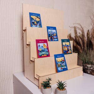 Estante para tarjetas de felicitación, expositor para tiendas minoristas, escaparate de mercado, expositor de pegatinas, expositor escalonado, expositor de postales, expositor para tiendas