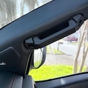 Pair of low profile grab bars for 2016-2024 Nissan Titan