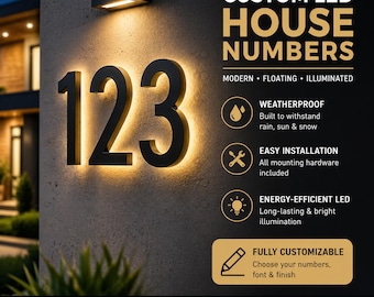May include: Black illuminated house numbers '123' mounted on a wall. The numbers are lit with a warm glow, and the image includes text that says 'Custom LED House Numbers' and 'Fully Customizable'.