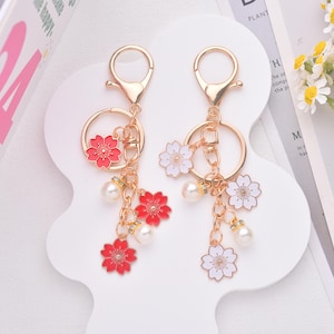 Chaveiro Sakura, Pingentes de flores simples, Pingentes para carteira, Joias de flor de cerejeira, Presentes femininos, Pingentes fofos para bolsa, Presentes para ela