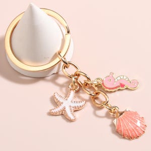 Chaveiro criativo de estrela do mar com concha, chaveiro de gota de óleo de aço inoxidável, chaveiro de estrela do mar com oceano, dia dos namorados, presente para melhor amiga, presente para ela