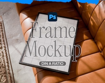 May include: A rectangular black picture frame containing a white grid pattern on a light background. The frame is positioned at an angle. The text "Ps" appears in a blue square above the frame, and the text "DIN A RATIO" is inside a gray oval.