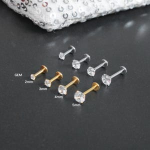 Pendiente pequeño para trago, titanio de 18 g con bisel dorado, pendiente para hélix delantero, piercing para trago, pendiente de caracola, delicado y pequeño de 1 mm.