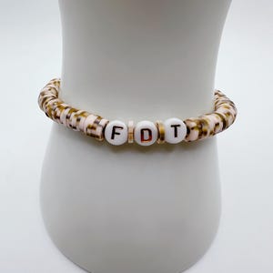 FDT camouflage friendship bracelet | oppose Trump and Musk | size 7 inches (medium / average) | made with clay heishi disc beads