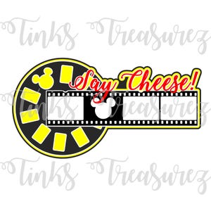 May include: A black and yellow film strip with a Mickey Mouse head in the center. The film strip has three empty frames and the text "Say Cheese!" in red.