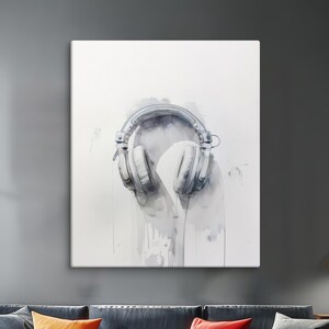 May include: A watercolor painting of white headphones on a white background with gray watercolor splatters.