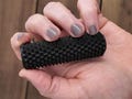 Classic Black Handheld Spiky Roller Fidget Toy With Hidden Storage