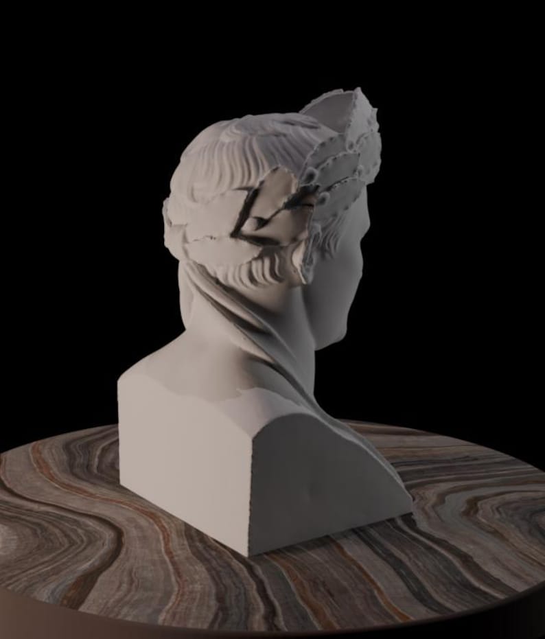 May include: A white bust of a person with a laurel wreath crown. The sculpture is set on a round table with a brown and tan marble-like surface. The background is black.