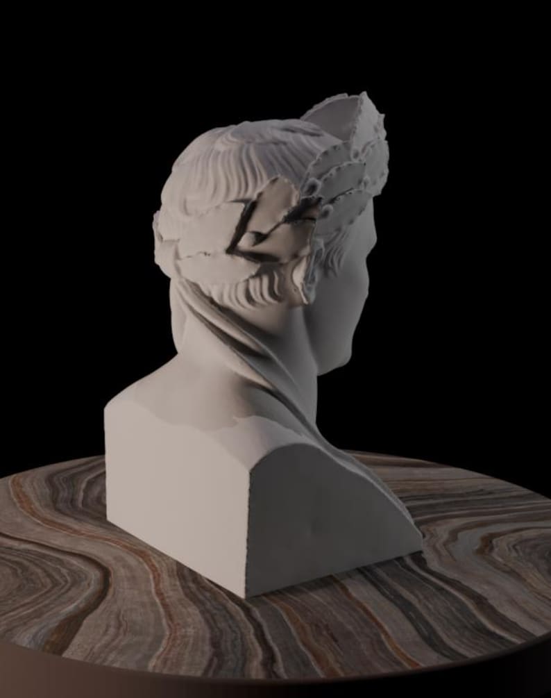 May include: A white bust of a person wearing a laurel wreath, set against a black background. The sculpture is on a round table with a brown and tan marbled surface. The bust is a classical art piece.