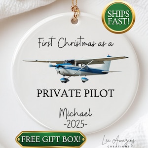 May include: White ceramic Christmas ornament with a blue and white airplane design. Text includes "First Christmas as a Private Pilot", a name, and the year 2025. Includes the text "FREE GIFT BOX!"