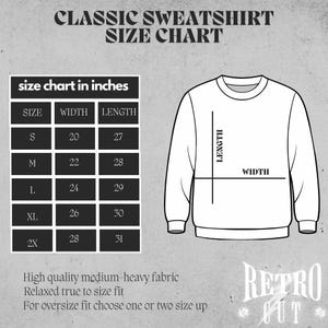 May include: Size chart for a classic sweatshirt in inches. The chart shows the width and length of the sweatshirt in inches for sizes S, M, L, XL, and 2X. The chart also includes a diagram of a sweatshirt with the width and length measurements labeled.