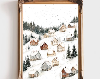 May include: A framed watercolor print depicting a snowy hillside landscape with scattered small houses in shades of red, brown, and grey, surrounded by evergreen trees and falling snow. The ornate gold frame features decorative corner details.