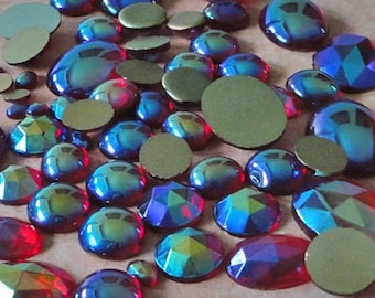 13x18 mm vintage FACETED glass cabochons in ruby AB. NOS West German glass stones in transparent red with color shifting aurora borealis.
