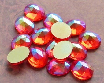 Small 8x10 mm FACETED glass cabs in orange hyacinth AB. Lot of 6 vintage West German oval cabochons in vibrant Hyazinth aurora borealis.