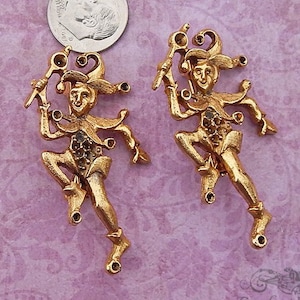2 Brassy gold toned metal brooch pin components with harlequin motif. Vintage jewelry findings with pin back and spaces to set rhinestones.