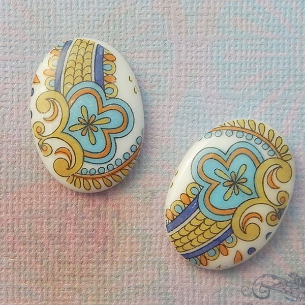 1960's vintage West German glass cabochons with abstract clover pattern. 18x25 mm decal cabs with paisley design. Choose 2 pc or 4 pc