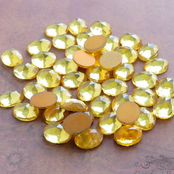 6 small 8x10 mm FACETED glass cabochon stones in golden yellow topaz. Sparkling vintage West German oval cabs for rings, earrings & accents.