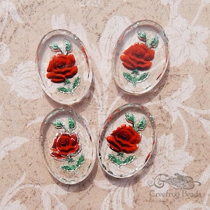 4 red rose glass intaglio stones with crystal clear base. 18x25 mm cabochon w/reverse painted burgundy & red flower. 1960's German cabs.