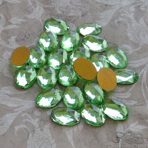 10x14 mm FACETED glass cabochons in peridot green. Lot of 6 vintage West German flat back oval stones for beadwork & costume jewelry repair.