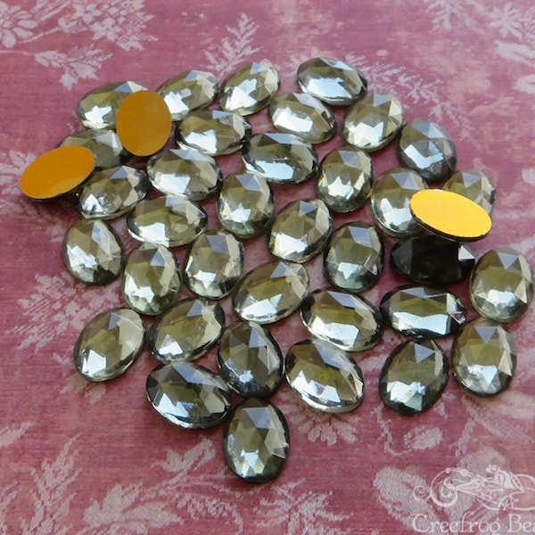 10x14 mm FACETED glass cabochons in transparent smoky grey. Lot of 6 vintage West German oval stones for beadwork & costume jewelry repair.