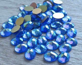 Small 8x10 mm FACETED glass cabochons in sapphire blue aurora borealis. Lot of 6 vintage West German cabs in saphyr AB for rings & earrings.