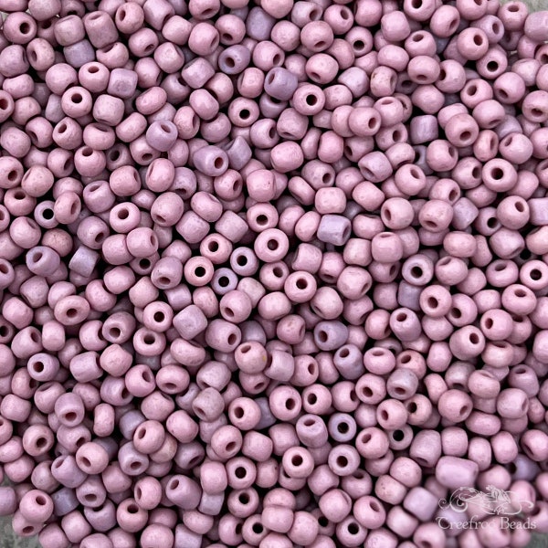 Old Czech glass seed beads, size 8/0 soft pink & pale purple mix. 90's vintage rocailles in opaque purplish pink hues, by the ounce or hank.