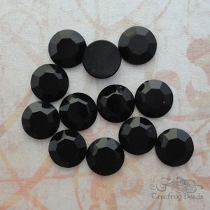 1970&#39;s vintage Swarovski lead crystal flatbacks in jet black. Art 2000, 8 facet flat back rhinestones in 42ss/ 9mm. Choose 6 pc or 12 pc