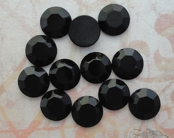 1970's vintage Swarovski lead crystal flatbacks in jet black. Art 2000, 8 facet flat back rhinestones in 42ss/ 9mm. Choose 6 pc or 12 pc