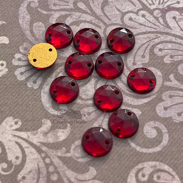 1950's Vintage glass sew-on beads in transparent ruby red, 8mm faceted rounds with 2 holes. Lot of 12 flat back sew ons w/ gold foiled backs