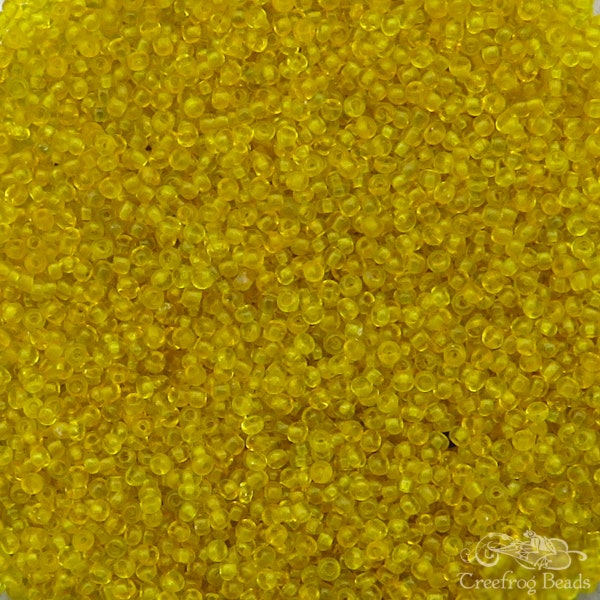 Size 14/0 vintage glass micro seed beads in transparent yellow. Antique Victorian era microbeads for purse repair & beadwork restoration.