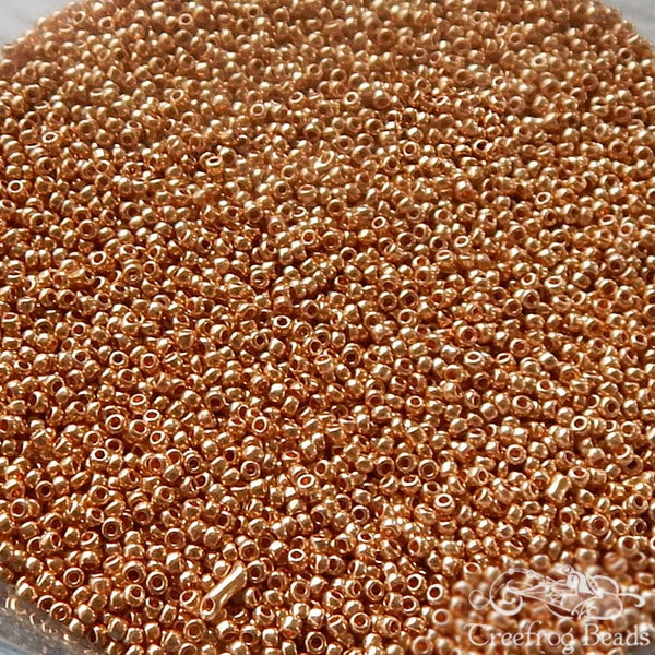 Size 14/0 or 15/0 glass seed beads. Late 1800's vintage microbeads in metallic golden bronze. Tiny beads for doll makers & purse repair.