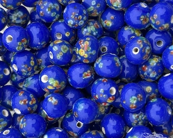 1960's vintage Japanese Tombo glass beads in royal blue with multicolor flowers. 6 pc lot of 8mm handmade lamp work beads made in Japan.