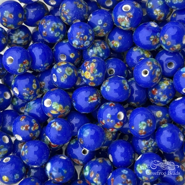 1960's vintage Japanese Tombo glass beads in royal blue with multicolor flowers. 6 pc lot of 8mm handmade lamp work beads made in Japan.
