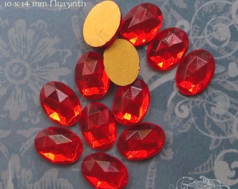 6 vintage 10x14 mm FACETED glass stones in transparent orange hyacinth. West German flat backed oval cabochons with gold foil.