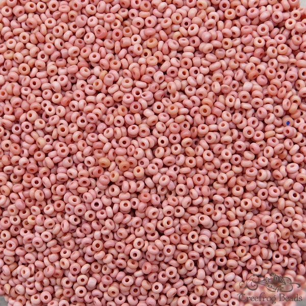 Size 13/0 vintage seed beads in classic pale Cheyenne pink. 10 gr of old Czech glass beads in dusty rose pink with a hint of peach or salmon