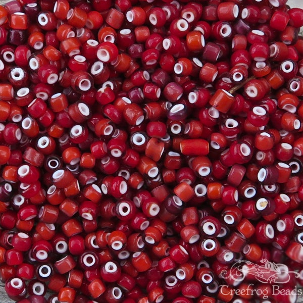 Size 6/0 red rose vintage Italian white heart seed beads. 10 grams of antique Venetian glass Hudson Bay or Cornaline D'Allepo beads.