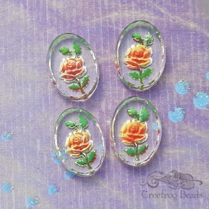 4 Vintage German 13x18 mm yellow rose cabochons. Reverse painted intaglio cabs on clear glass with beautiful beveled edges.