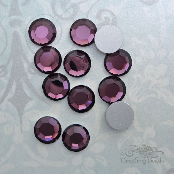 Vintage Swarovski kristallen plaksteentjes in transparant amethist paars. Art 2000 platte stenen in RVS 42 of 9 mm. Kies 6 of 12 st