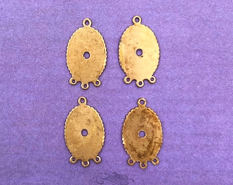 13x18 mm raw brass cabochon settings for oval stones. 4 piece lot of vintage findings with top loop, rivet hole & 3 loops below for dangles.
