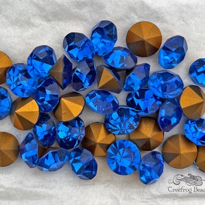 Strass en cristal tchèque Optima vintage des années 1970 avec dos pointu. Chatons en cristal bleu saphir en acier inoxydable 48 de 10,5 à 10,9 mm. 6 ou 12 pièces