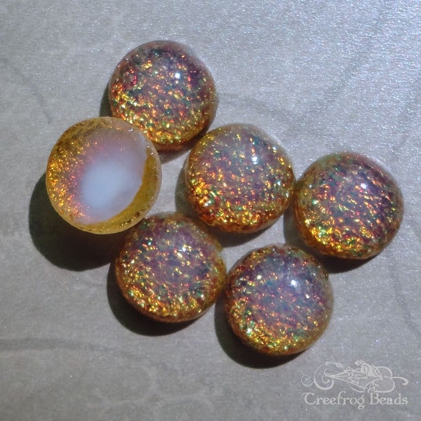 Vintage harlequin glass cabochons in 13mm round. Faux fire opal cabs made in Japan. Unfoiled flat back stones with play of light. 2 or 4 pc