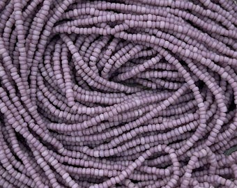 Antique glass beads: tiny size 14/0 - 16/0 seed beads in opaque variegated pale purple (5 grams)
