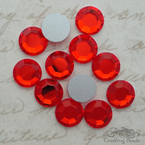 Art 2000 flatback rhinestones. Vintage Swarovski crystal stones in hyacinth orange. ss 42 or 9mm flat backs w/silver foil. Choose 6 or 12 pc