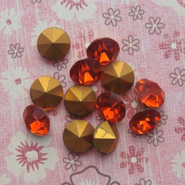 Vintage Swarovski crystal chatons with pointed backs. ss48 / 11 mm pointback rhinestones in transparent orange hyacinth. Choose 6 or 12.
