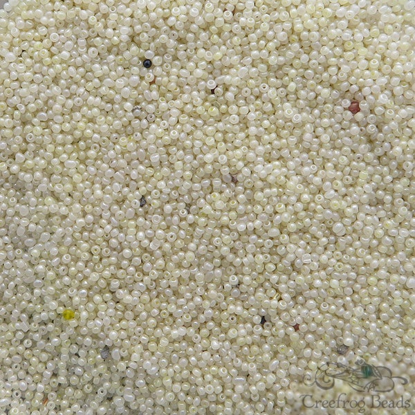 Size 20/0 antique microbeads in creamy pearl white. Vintage glass micro seed beads for miniature work, doll arts and purse repair.