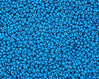 Size 12/0 antique Italian seed beads in opaque Spanish blue. 10 grams of handmade vintage Venetian glass beads in dark turquoise blue.