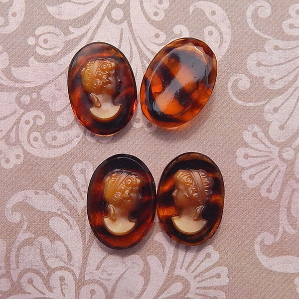 Vintage glass cameos with woman's face in butterscotch on tortoise shell. 18x13 mm cabs w/ raised face in amber and browns. 2 or 4 pc