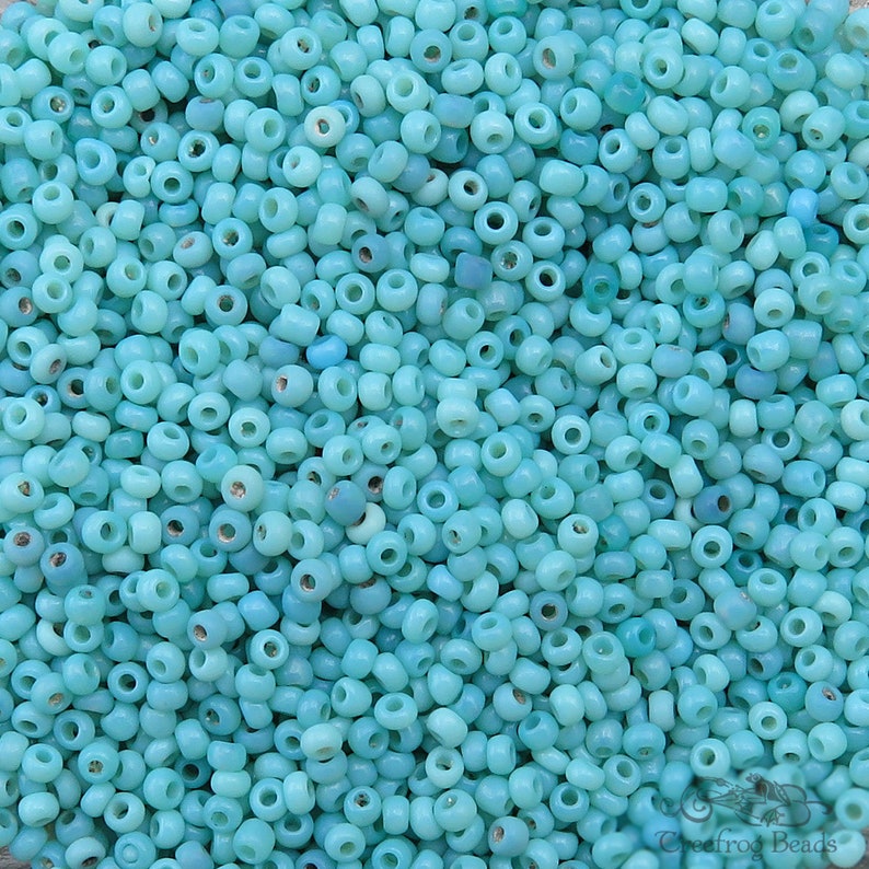 Size 11/0 antique Italian seed beads in opaque baby blue and turquoise mix. 10 grams of vintage Venetian glass beads in shades of pale blue. image 1