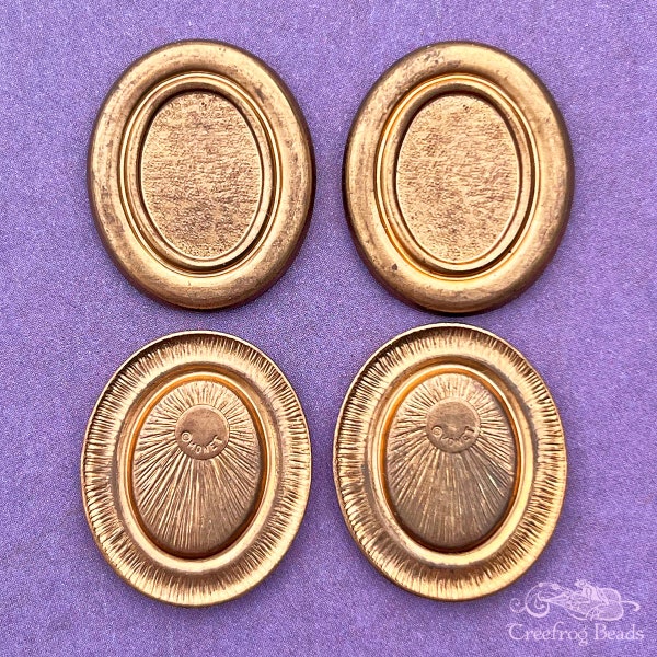 Vintage Monet raw brass cabochon settings for 10x14 mm oval stones. 4 piece lot of thick die struck bezel trays with old Monet jewelry logo.