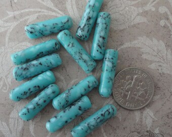 12 Porcelain cylinder beads in turquoise w/ white & black speckles. 20 mm long vintage Japanese tube shapes in robins egg blue.